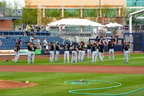 Spring Training baseball players warming up on field in Arizona Stock Photos