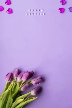 Spring tulip and text Happy Birhday on english laid out of multi-colored cube on Stock Photos