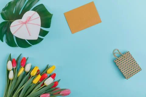 Spring tulips frame on background, top view. Stock Photos
