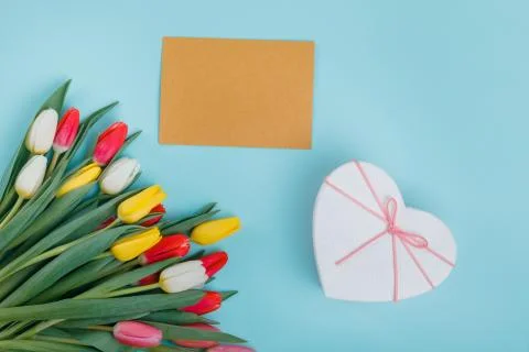 Spring tulips frame on background, top view. Stock Photos