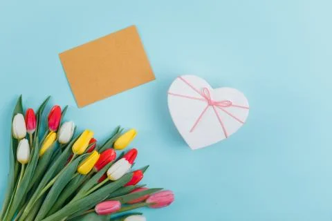 Spring tulips frame on background, top view. Stock Photos