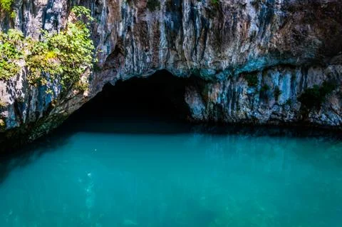 Spring under the cave Stock Photos