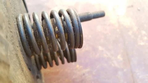 Spring valve on the engine block. Stock Photos