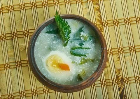 Spring vegetable soup nettle. Stock Photos