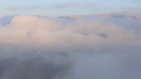 In spring the veil of mist creeping up the mountain slopes of the Caucasus Vídeo Stock 63222264