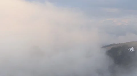 In spring the veil of mist creeping up the mountain slopes of the Caucasus Vídeo Stock 63222303