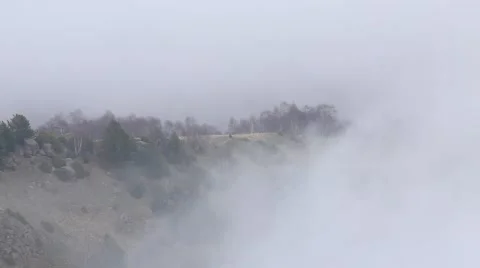 In spring the veil of mist creeping up the mountain slopes of the Caucasus Vídeos de archivo 63222339
