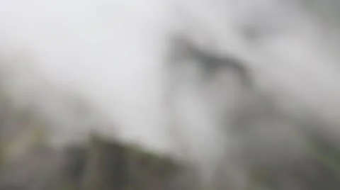 In spring the veil of mist creeping up the mountain slopes of the Caucasus 動画素材 63223131