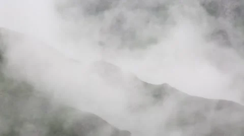In spring the veil of mist creeping up the mountain slopes of the Caucasus Vídeos de archivo 63223223