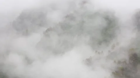 In spring the veil of mist creeping up the mountain slopes of the Caucasus Видео 63223309
