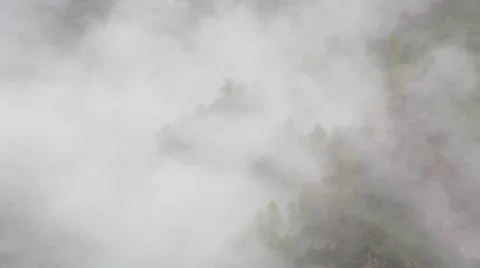 In spring the veil of mist creeping up the mountain slopes of the Caucasus Видео 63223324