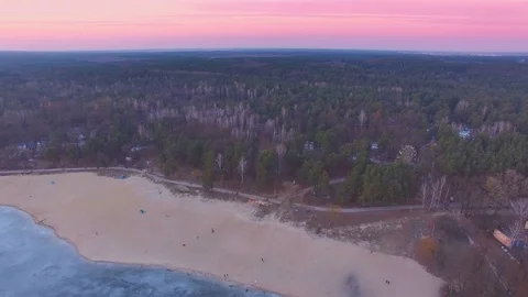 Spring view of coast and forest and ferris wheel Stock Footage 73800210