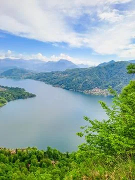 Spring view of Lake Lugano in the town of Caslano in the Swiss mountains Stock Photos