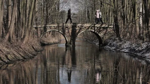 Spring walk,bridge over the river Stock Footage 48492992