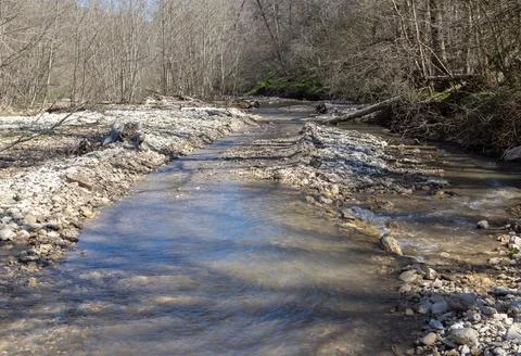 Spring walks in the highlands, riverbed, forest, and panorama of the area Stock Photos