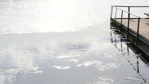 Spring. water and ice. the sky is reflected in the water. Stock Footage 104237833