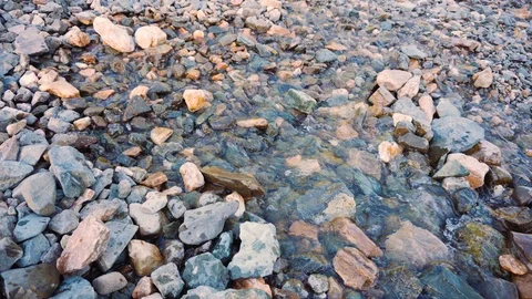 Spring water flows out of the ground Stock Footage 111570353