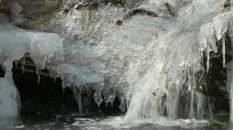 Spring waterfall with ice Stock Footage 21781132