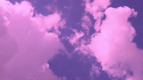 Spring white lilac pink plump clouds on the sunny sunrise purple blue sky, airpl Stockbeeldmateriaal 332216168