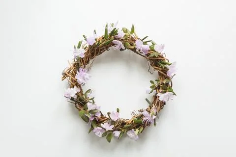 Spring wreath with flowers. Creative flat lay. View from above. Stock Photos