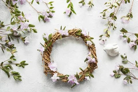 Spring wreath with flowers. Creative flat lay. View from above. Stock Photos