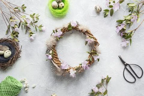 Spring wreath with flowers. Creative flat lay. View from above. Stock Photos