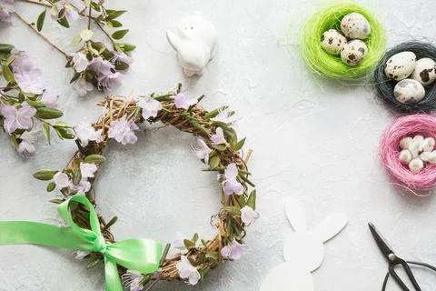 Spring wreath with flowers. Creative flat lay. View from above. Stock Photos