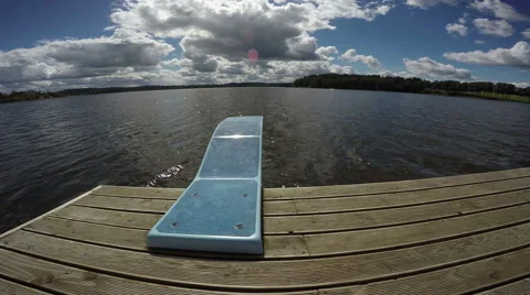 Springboard to lake, 4K Stock Footage 68898397