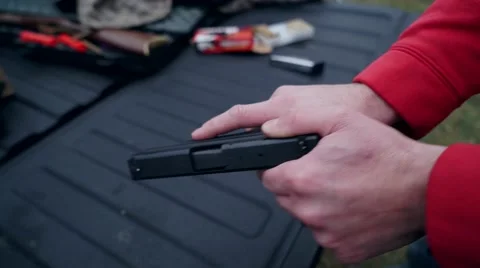 Springfield 45 Caliber ejecting bullet shell Video stock 46031935