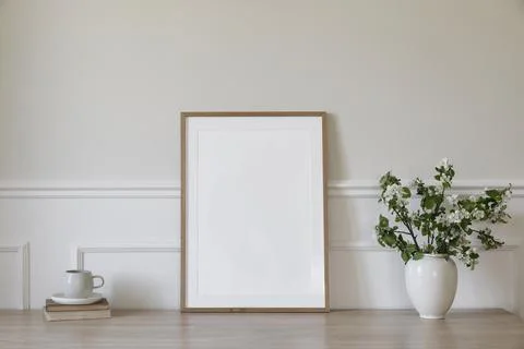 Springtime breakfast still life. Empty picture frame poster mockup. White Fotos de archivo