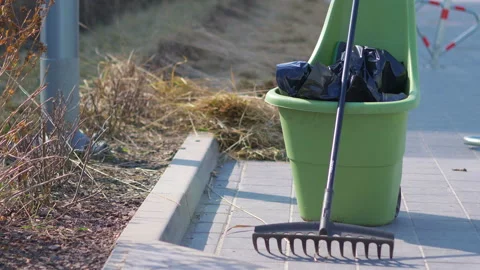 Springtime cleaning in the garden in 4k slow motion 60fps Stock Footage 152576951
