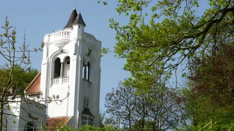 Springtime scenery in Belgium :  belvedere tower dolly shot Stock Footage 106940076