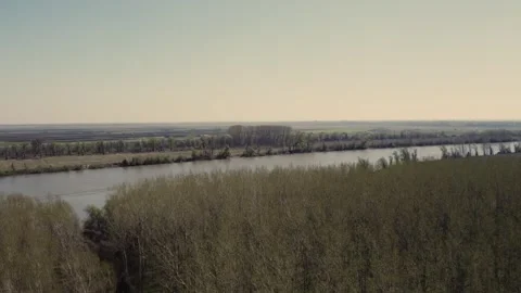 Springtime Serenity: Aerial Drone View of a River Stock Footage 255981596