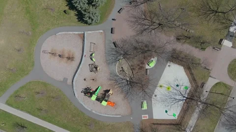 Springtime solitude: aerial view of deserted playground Stock Footage 273866531