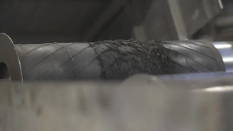 Springy crumbs fall with vibration into rigid echoing box Stock Footage 314643721