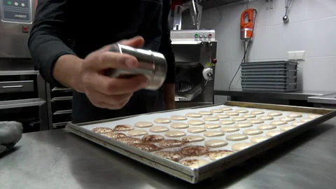 Sprinking Caramel Onto Macarons Stock Footage 136342718