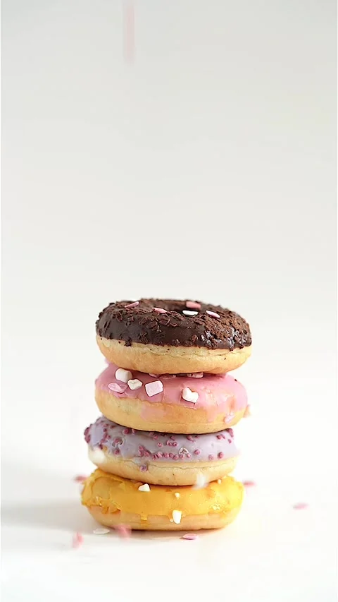 Sprinkle Bliss: A Colorful Donut Delight Stock Footage 299575758