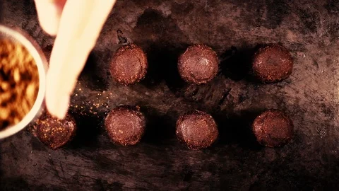 Sprinkle candy cocoa powder from a small spoon-sieve Stock Footage 91702034