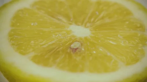 Sprinkle lemon with sugar closeup. Slow motion Stock Footage 75568074
