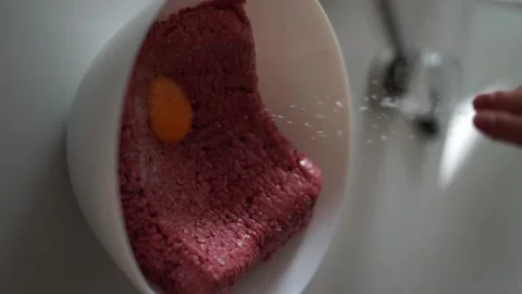 Sprinkle minced meat with salt Video stock 244859082