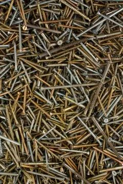 Sprinkle of the old screws Stock Photos