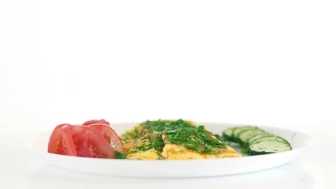Sprinkle the omelette with chopped herbs. Stock Footage 89426956