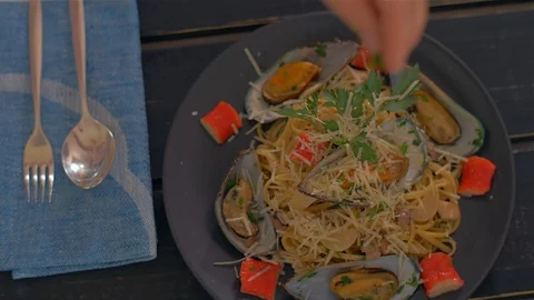 Sprinkle with parsley. Seafood paste and mussels Stock Footage 111669423