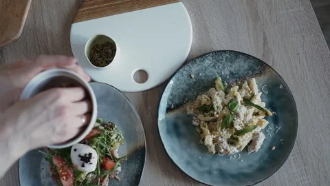 Sprinkle pasta with nuts Stock Footage 164386314