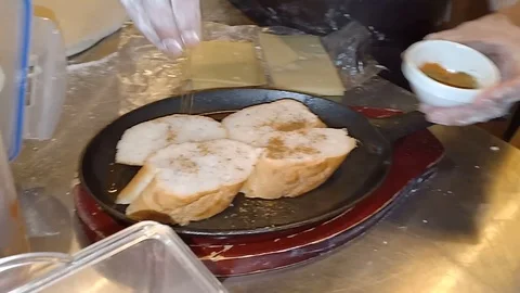 Sprinkle Pepper on Bread - Easy Seasoning 動画素材 108530418