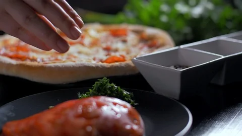 Sprinkle pizza with green herbs Stock-Footage 106153677