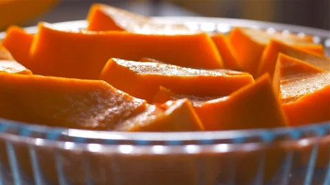 Sprinkle a pumpkin with powdered sugar before it is baked. Slow motion Stock Footage 105879030