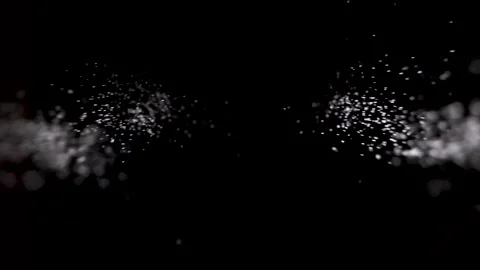 Sprinkle salt or glitter in slowmotion down into black background. Stock Footage 146894732