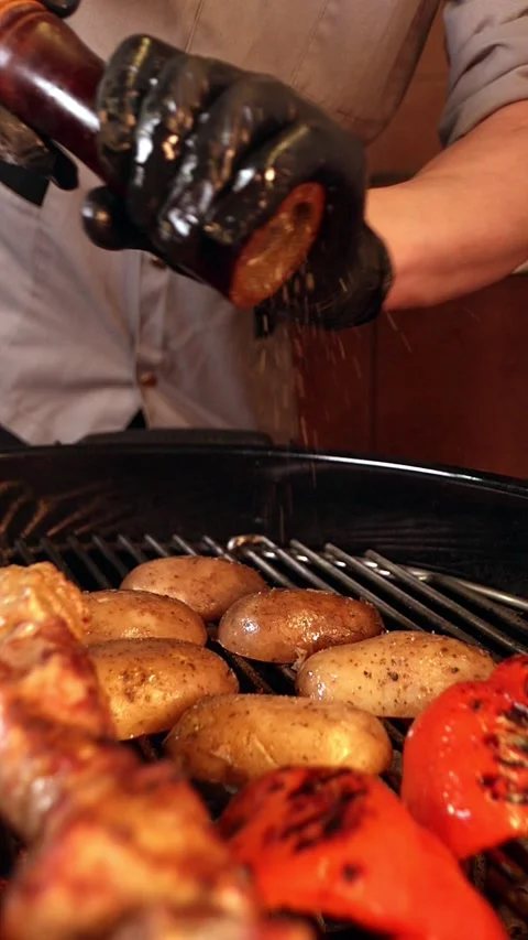 Sprinkle the shish kebab with pepper Stock Footage 219015397