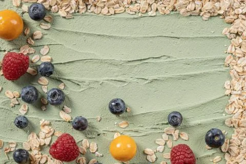 Sprinkled berries on the board. Stock Photos